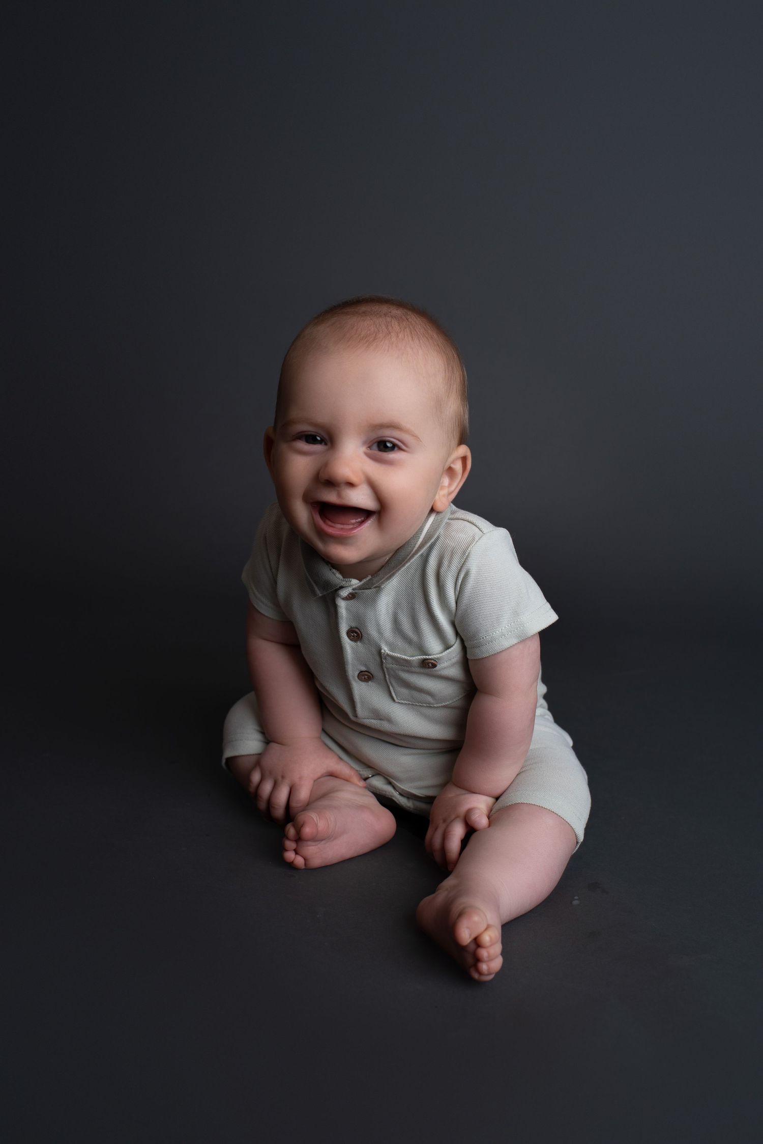 baby smiling at camera for Exeter baby photography